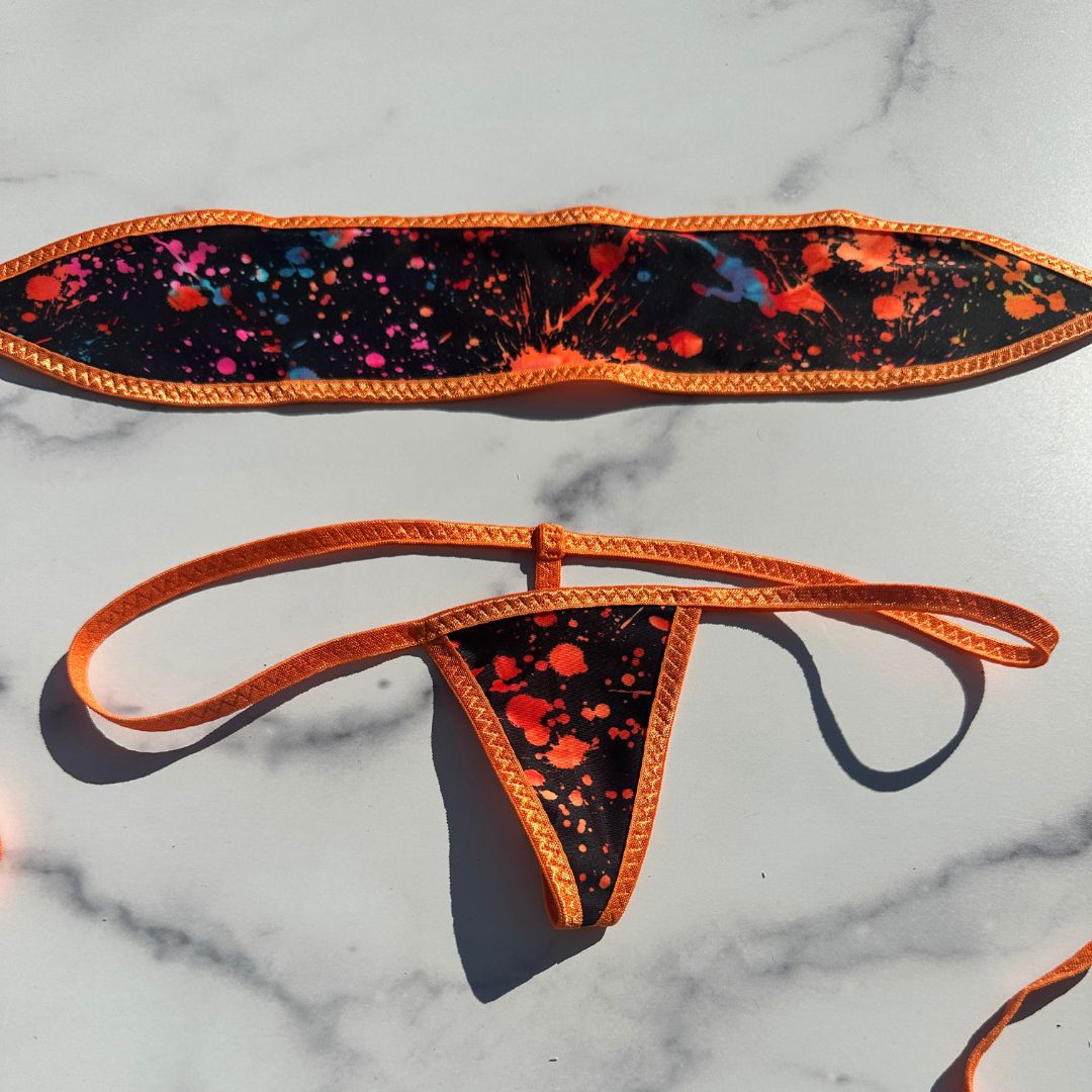 Paint Splatter GLOW IN BLACK LIGHT - Orange - Bandeau with Micro G-string Thong